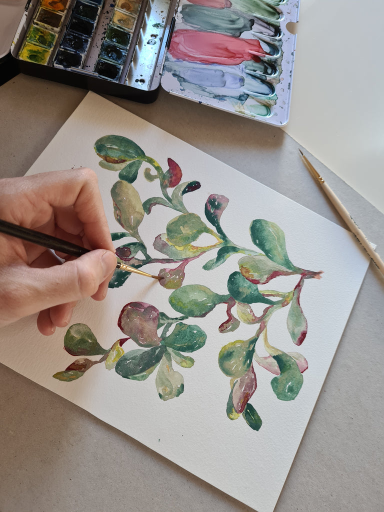 Detalle hojas verdes pintadas con pincel y acuarelas